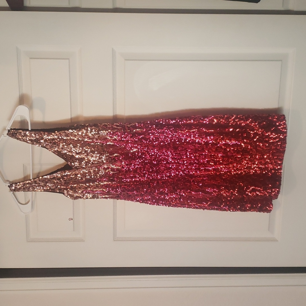 Ombre color sequin dress. From gold to red.